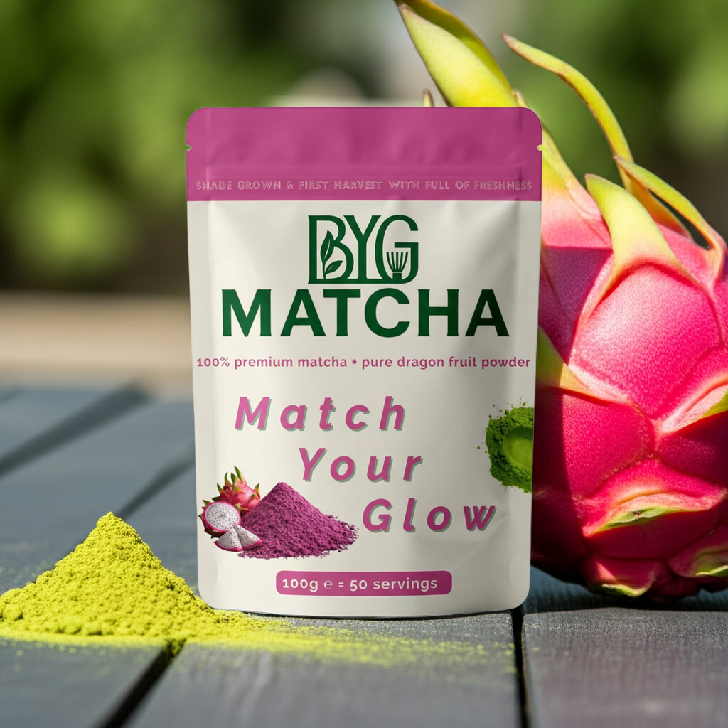 BYG Matcha packaging with dragon fruit and matcha powder on a wooden surface